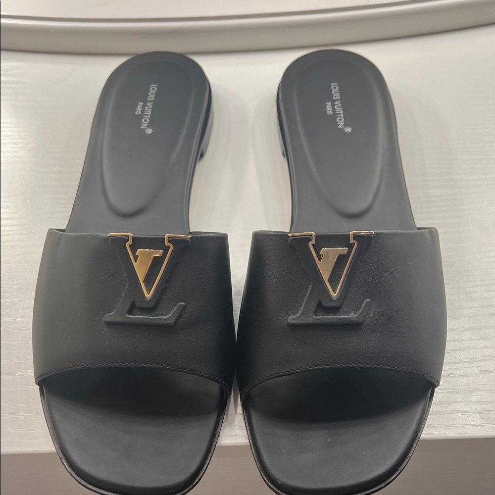Louis Vuitton Black Slides with Gold Logo